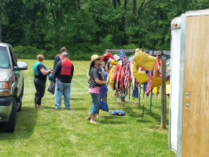 Customers getting their life vests